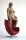 skulptur af en kvinde i en rød stol af Lars Calmar